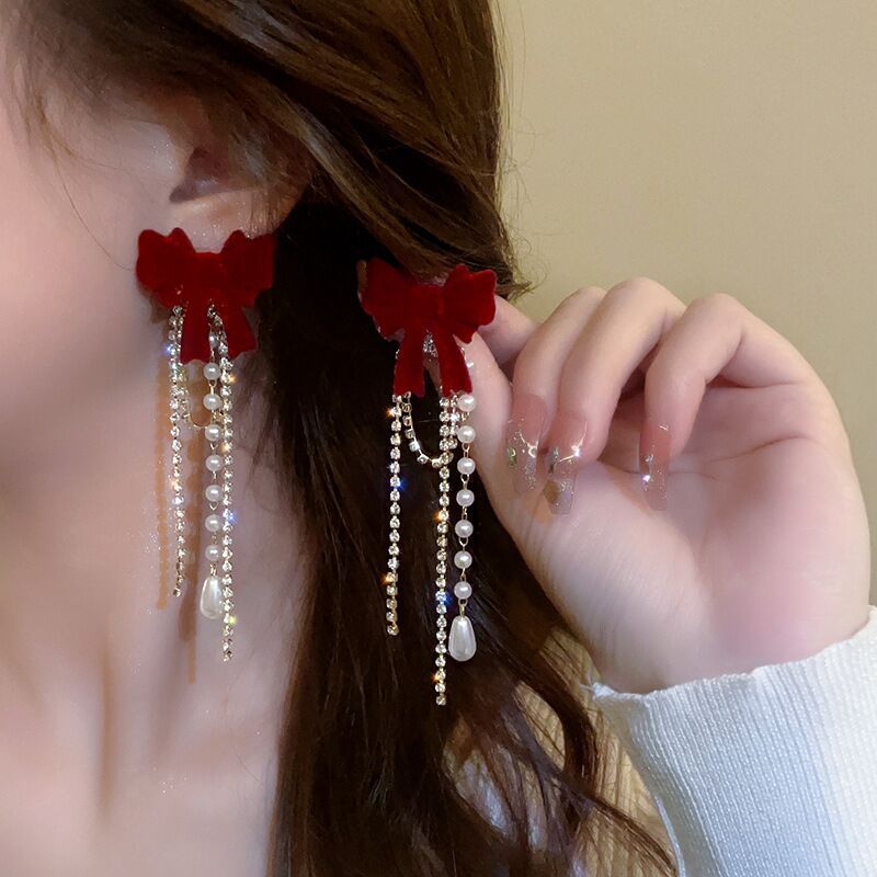 ANGEL BOW EARRINGS