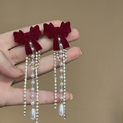 ANGEL BOW EARRINGS