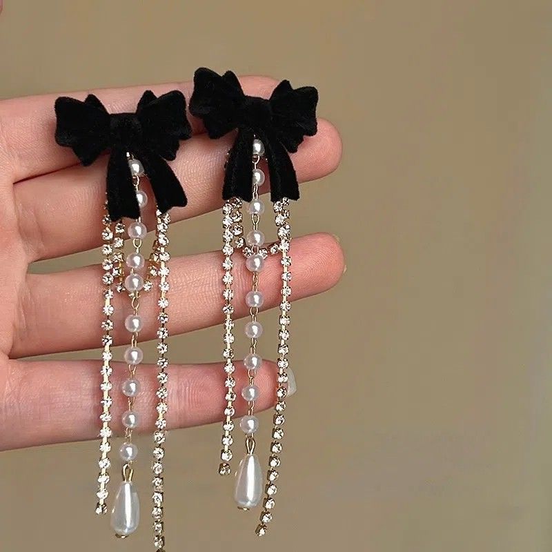 ANGEL BOW EARRINGS