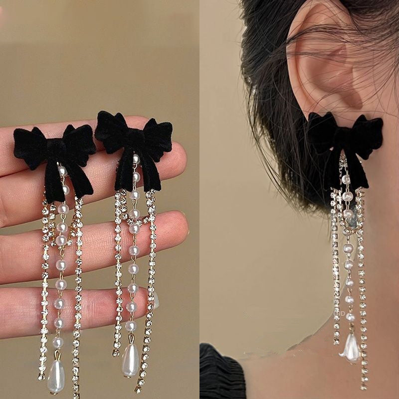 ANGEL BOW EARRINGS